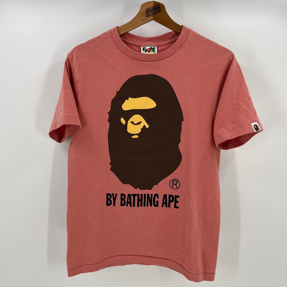 A Bathing APE BAPE Nigo OG Classic Logo Head Tee in Peach S